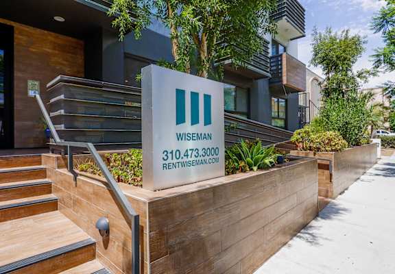 a building with a wesleyan sign in front of it