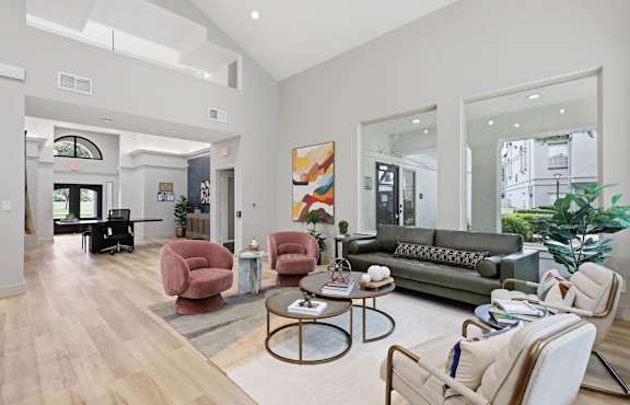 A living room with a grey couch and a coffee table.