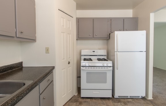 This is a photo of the kitchen in the 1004 square foot, 2 bedroom townhome floor plan at Colonial Ridge Apartments in the Pleasant Ridge neighborhood of Cincinnati, OH.