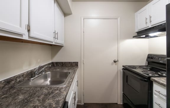 This is a photo the kitchen of the 925 square foot, Hazelnut 2 bedroom, 1 bath apartment at Montana Valley Apartments in the Westwood neighborhood of Cincinnati, OH.
