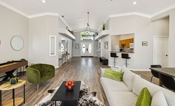 a living room with a couch and a table