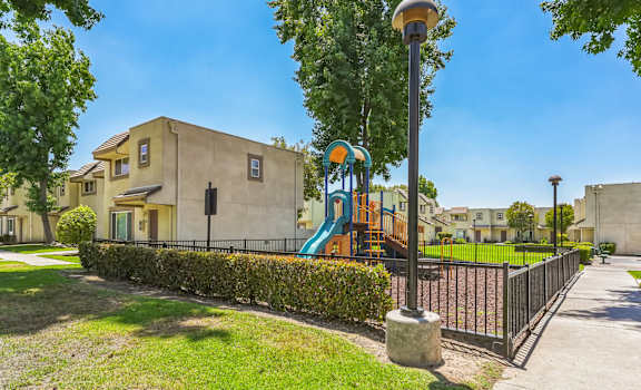 the preserve at ballantyne commons playground with a slide