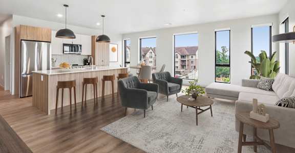 A modern kitchen with a dining area and a living room.