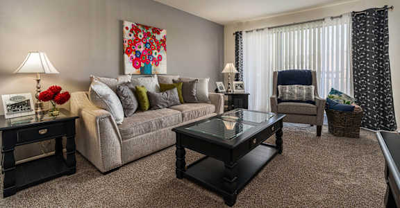 a living room with a couch and a coffee table