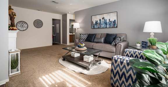 a living room with a couch and a coffee table