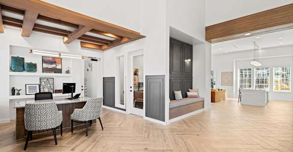 a dining room and living room with a table and chairs