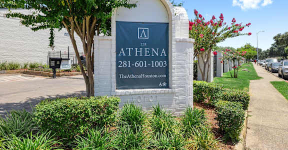 the sign at the entrance of the building