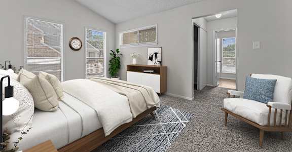 A bedroom with a bed, chair, and a ceiling fan.