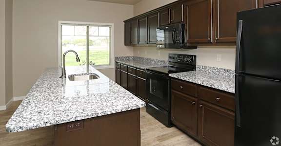 Kitchen with countertop at Fountain Ridge, Wisconsin
