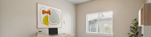 A room with a desk, chair, and a painting on the wall.