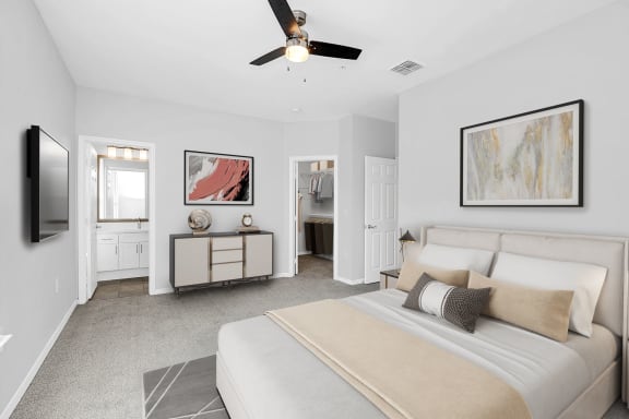 a bedroom with a large bed and a ceiling fan at Northlake Park, Florida