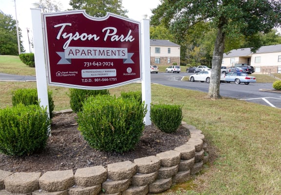 a sign for tyson park apartments