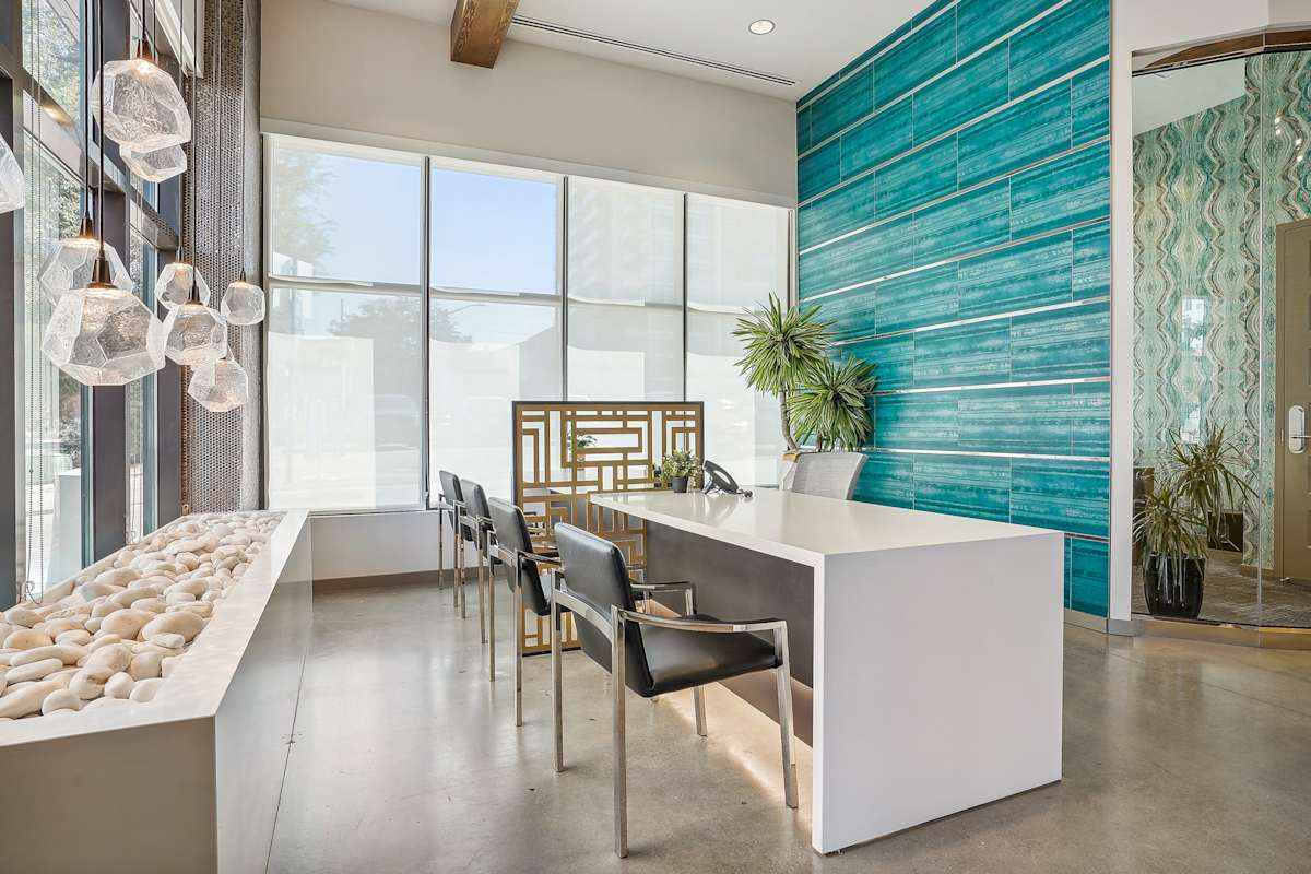 Civic Lofts communal table with skyline views - Denver, CO