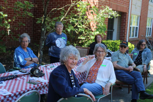 Residents enjoying the outdoors at Elison Independent and Assisted Living of Maplewood