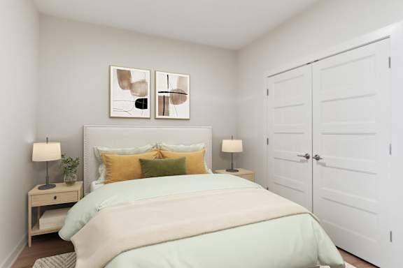 A bedroom with a bed, two nightstands, and a painting on the wall at Hawkins Press, Charlotte, North Carolina