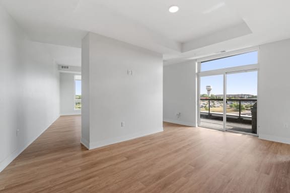 Spacious Living Area with Hardwood-Style Flooring