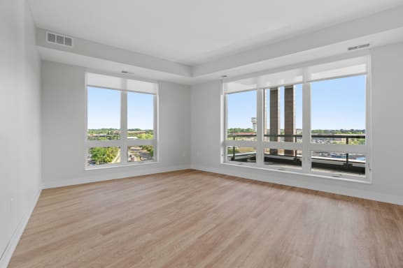 Large Living Room Area with Floor to Ceiling Windows