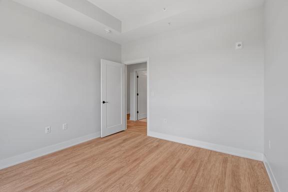 Bedroom with Wood Style Flooring