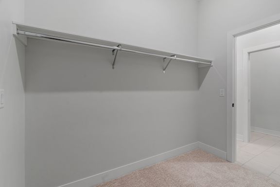 Walk-In Closet With Built-In Shelving
