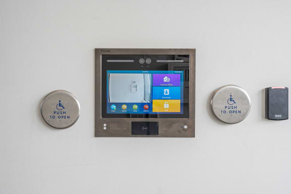 a display on a wall with three buttons