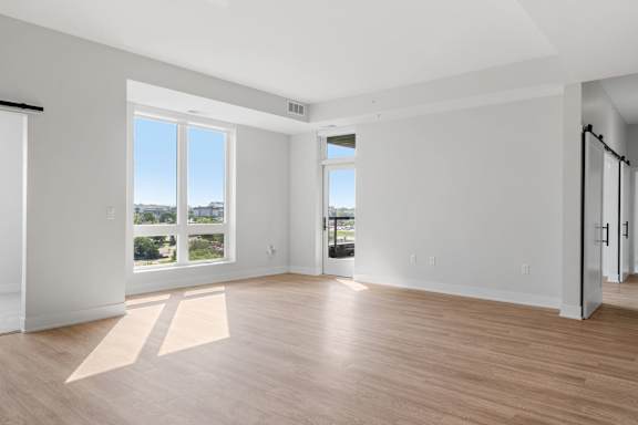 Spacious Living Area with Hardwood-Style Flooring