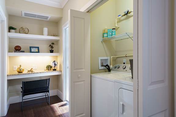 A laundry room with a washer and dryer.