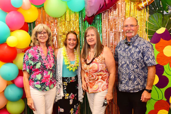 a group of people at a party with balloons at River Commons Senior Living, Redding, CA 96002