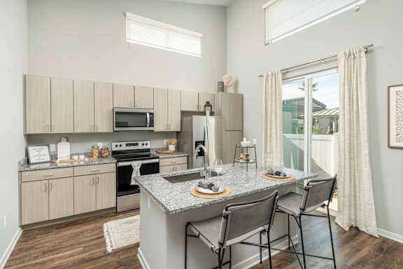 a kitchen with a marble counter top at Grandstone at Sunrise, Peoria, AZ, 85383
