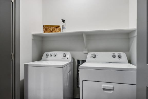 a small laundry room with two washes and a dryer at Stella Luxury Apartment Homes, Arizona, 85143