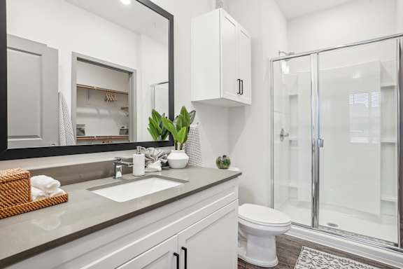 a bathroom with a sink toilet and shower at Notch66, Longmont, Colorado
