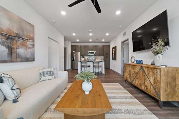 Living Room With Kitchen at The Quinn Luxury Apartments, Pensacola, FL