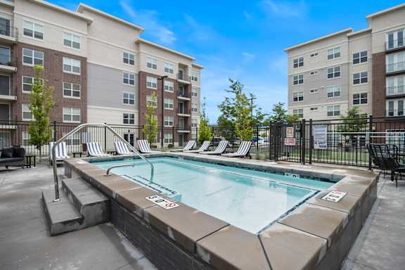 Resort style pool with lounge chairs3 at 200 City View, Provo, Utah