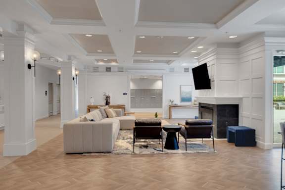 Clubhouse Living Area with fireplace1 at AVIA Apartments On Alpha, Dallas, TX, 75240