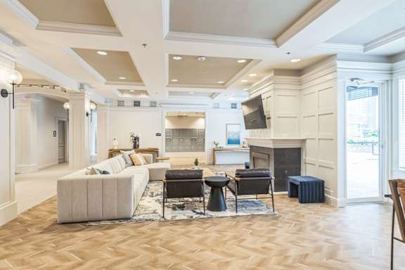 Clubhouse Living Area with fireplace at AVIA Apartments On Alpha, Dallas, TX