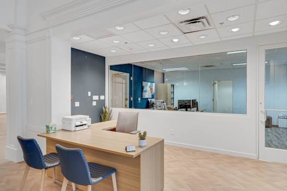 Leasing office desk at AVIA Apartments On Alpha, Texas