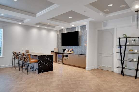 Kitchen with bar at AVIA Apartments On Alpha, Dallas, TX, 75240