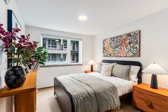 Bedroom with bed and Nightstand at Solera Apartments, Renton, 98056