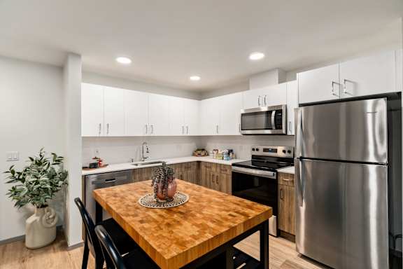 Kitchen and Dining Room with Table at Solera Apartments, Renton