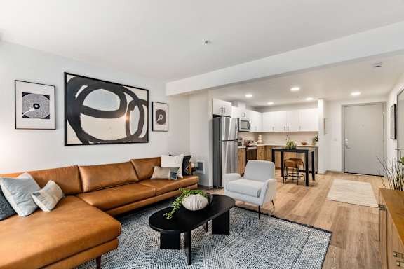 Brown Leather Couch at Solera Apartments, Renton, WA