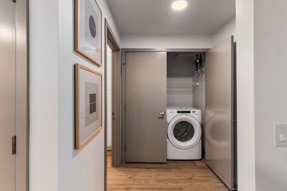 Laundry Room at Solera Apartments, Renton, WA
