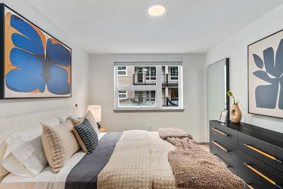 Bedroom with a Cozy Bed at Solera Apartments, Renton