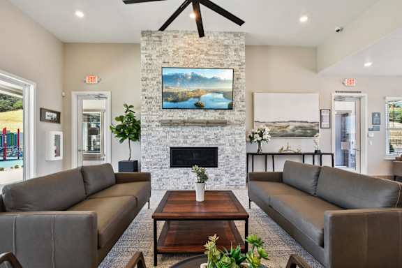A Living Room with Fireplace at Montessa Apartments, Vacaville, 95687