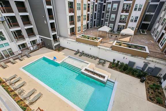 Aerial View of Shimmering Pool at Harrisburg Lofts, Houston, TX
