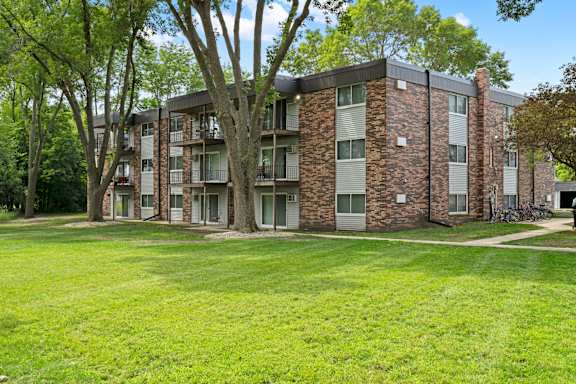 our apartments offer a spacious courtyard with green grass