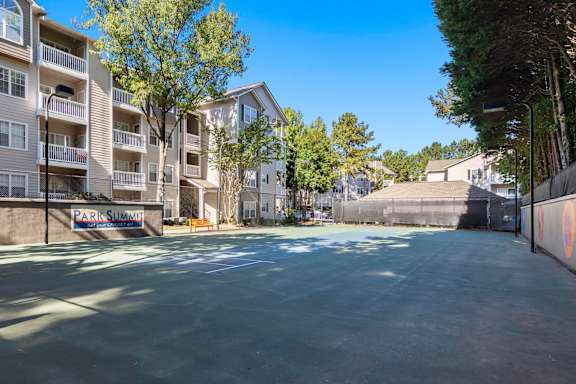 A sunny day at the Park Summit apartment complex with a clear blue sky.