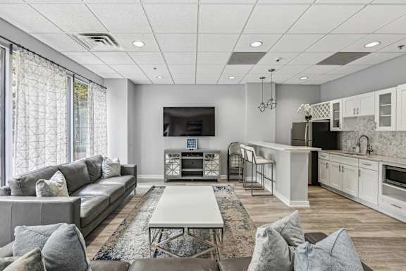 a living room with a couch and a table