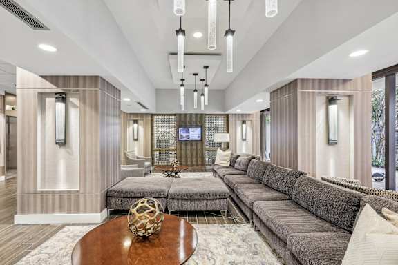 a living room with couches and a table