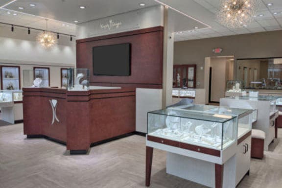 a museum with a reception area and a display case