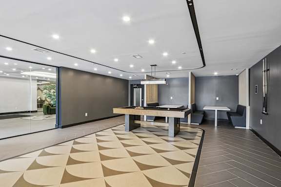 A modern room with a tan and black checkered floor.