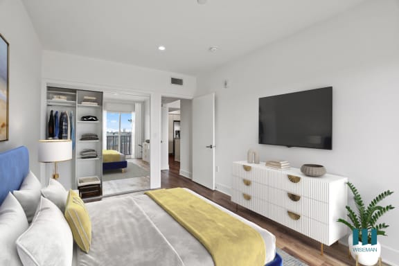 a bedroom with a bed and two night stands